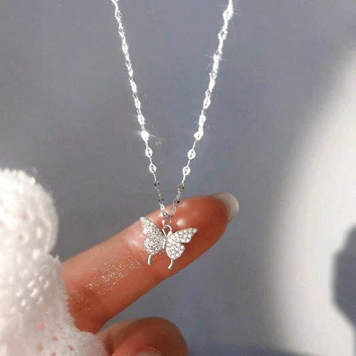 The "Stardust Wings" Pavé Butterfly Pendant in 925 Sterling Silver