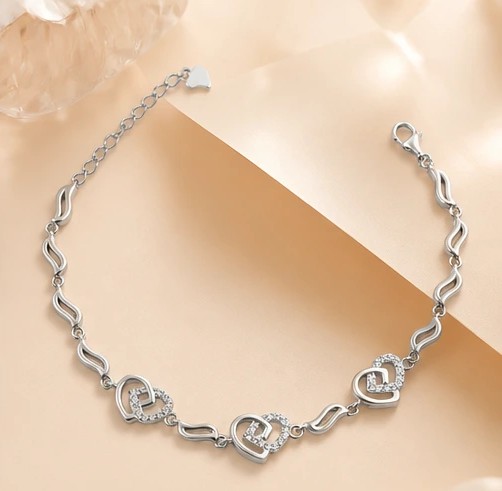 Interlocking Hearts Wave Link Silver Bracelet