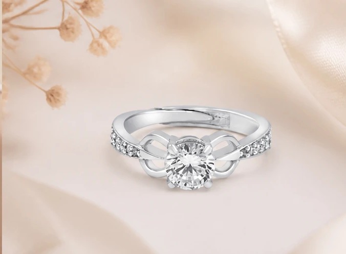 Eternity Bow™ Round Solitaire Infinite Knot Engagement Ring